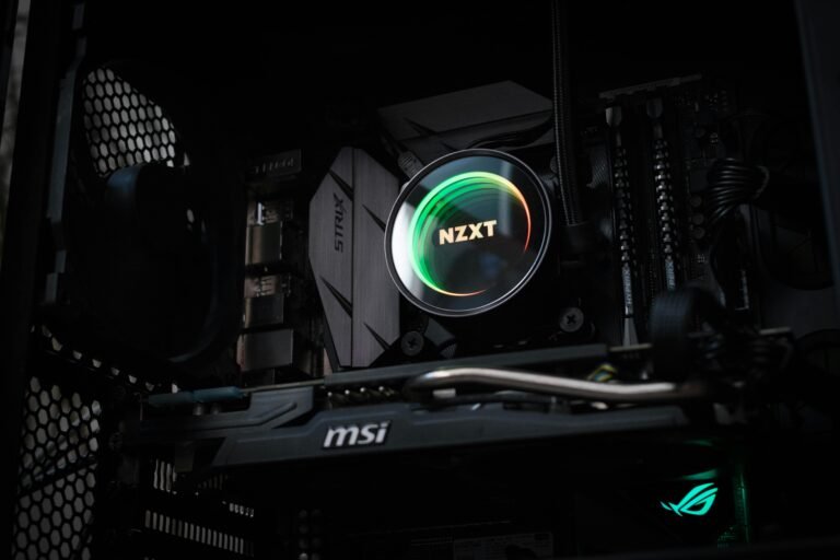Inside view of a PC with a spinning fan and visible GPU – what is a GPU driver and how it enhances graphics performance.